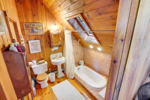 an overhead view of a bathroom with a toilet and a sink at Pet-Friendly Cabin Overlooking Sleepy Hollow Lake in Athens