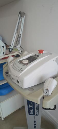 a machine sitting on top of a table at Royal-inn SPA & Pousada in Itanhaém