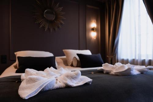 Postel nebo postele na pokoji v ubytování C0C00N Véritable Hammam à partager à deux