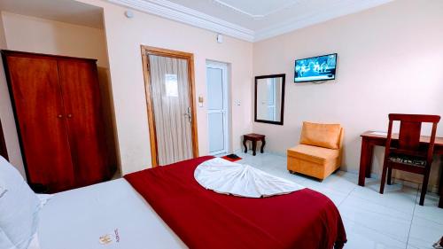Letto o letti in una camera di ALICIA HOTEL