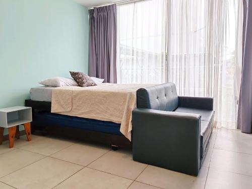 Ein Bett oder Betten in einem Zimmer der Unterkunft 0201 iFreses Hermoso Apartamento Full Equipado SIN PARQUEO