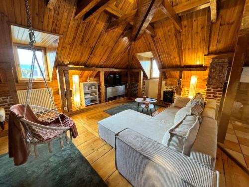 Katil atau katil-katil dalam bilik di Un Chalet dans la ville