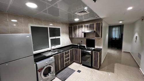 Nhà bếp/bếp nhỏ tại Big Cozy Studio