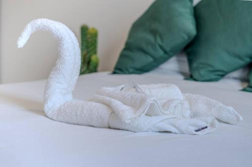 Ένα ή περισσότερα κρεβάτια σε δωμάτιο στο Cactus appartement T4