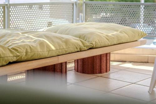 Ένα ή περισσότερα κρεβάτια σε δωμάτιο στο Cactus appartement T4