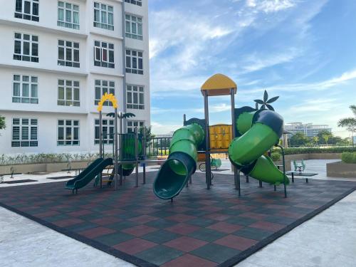 a playground in front of a building at the Anderson Ipoh 2BR by Goswell in Ipoh