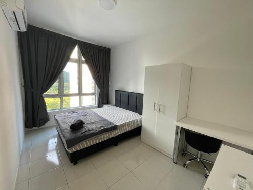 a bedroom with a bed and a large window at the Anderson Ipoh 2BR by Goswell in Ipoh