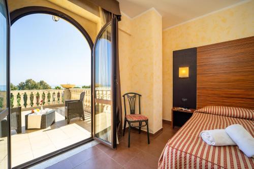 Ένα ή περισσότερα κρεβάτια σε δωμάτιο στο Kala Kretosa Hotel