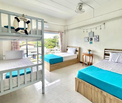 Ένα ή περισσότερα κρεβάτια σε δωμάτιο στο Family Room of Home one love