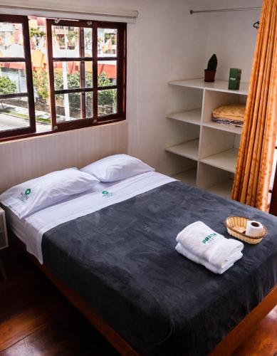 Postel nebo postele na pokoji v ubytování Hostel Prada