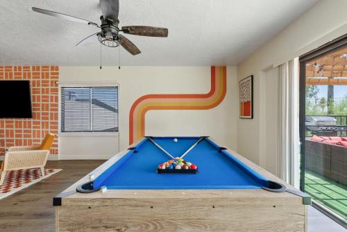 a pool table in a living room with a ceiling at Penthouse Free Parking Pool Table Private Balcony in Phoenix