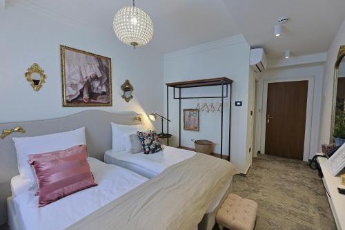 Postel nebo postele na pokoji v ubytování Integra Hotel