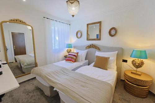 Postel nebo postele na pokoji v ubytování Integra Hotel