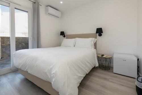 Katil atau katil-katil dalam bilik di Guest House J&C