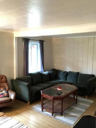 a living room with a couch and a coffee table at Amazing Home In Sysslebäck With 2 Bedrooms in Sysslebäck