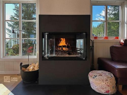 Fotografie z fotogalerie ubytování Luxury cabin Sjusjøen with hot tub, ski in-out, fireplace & WiFi v destinaci Ringsaker