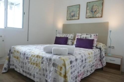 Postel nebo postele na pokoji v ubytování DELUX apartament Salou