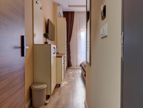 TV a/nebo společenská místnost v ubytování Midtown Prishtina Stays