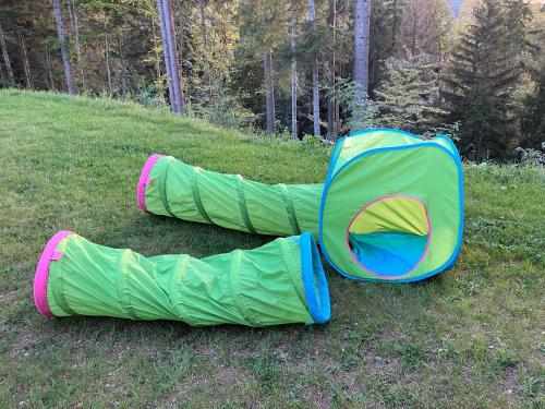 two sleeping bags on the grass in a field at Chata u Járy in Trojanovice