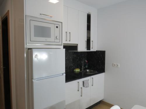 Una cocina o zona de cocina en San Froilan 40