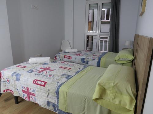 Cama o camas de una habitación en San Froilan 40