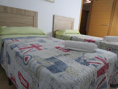 Cama o camas de una habitación en San Froilan 40