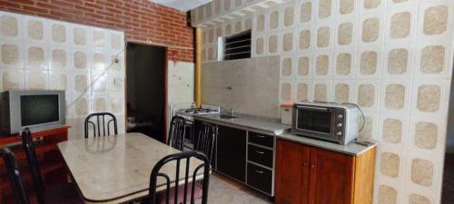 Kuchyň nebo kuchyňský kout v ubytování Mi casita de la suerte