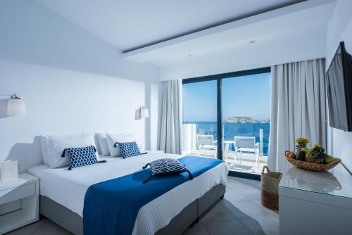 Posteľ alebo postele v izbe v ubytovaní Peninsula Resort & Spa