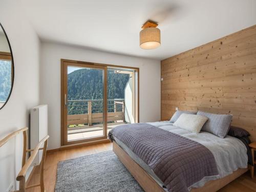 Postel nebo postele na pokoji v ubytování Le Theleme A201