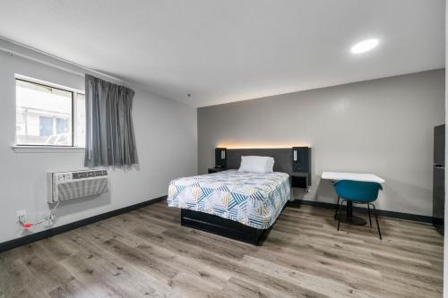 Ένα ή περισσότερα κρεβάτια σε δωμάτιο στο Southern Suites Cartersville
