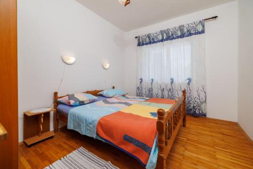 Posteľ alebo postele v izbe v ubytovaní Apartments Zvonimir