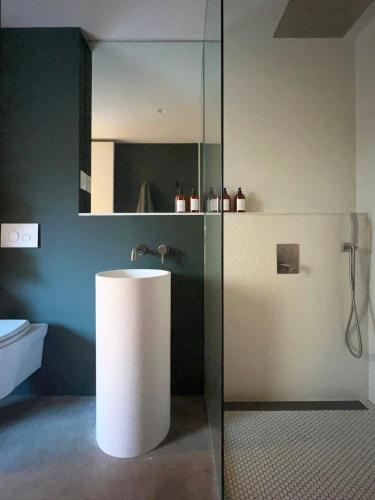 a bathroom with a sink and a mirror at Coldbrook Bed and Breakfast in Bearsville