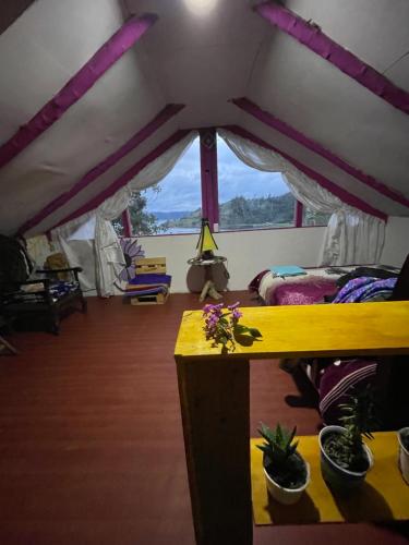 Ένα ή περισσότερα κρεβάτια σε δωμάτιο στο Cabaña Quinde