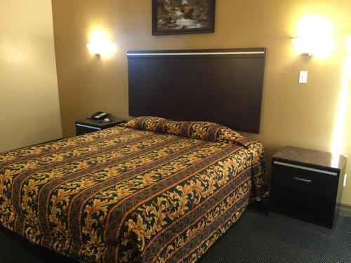 Ліжко або ліжка в номері Mountain Inn