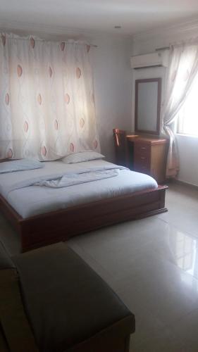 Postel nebo postele na pokoji v ubytování G Apartment