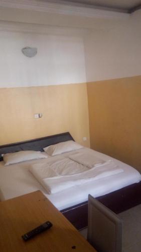 Postel nebo postele na pokoji v ubytování G Apartment
