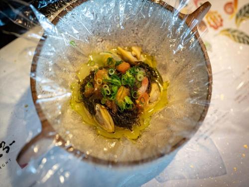a bowl of food in a blender at Oriental Hills Okinawa in Onna