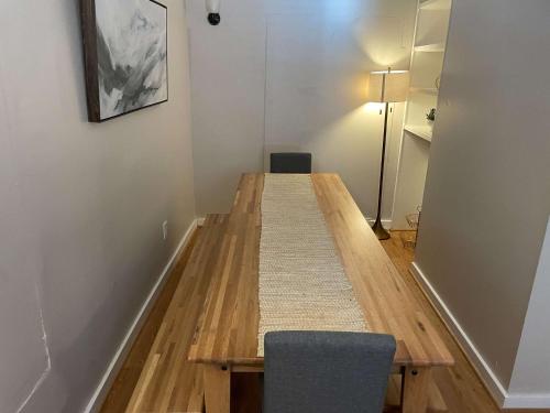a room with a table and a chair and a lamp at Mins to USC Hospital Zoo Columbia Duet-Unit A in West Columbia