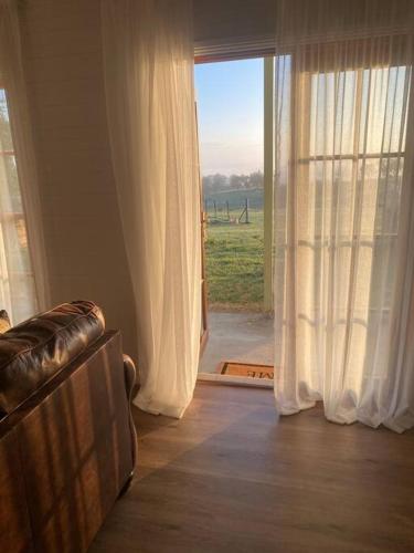 Χώρος καθιστικού στο Red Hill Farmstay Bathurst 3BR Spacious inside and out!