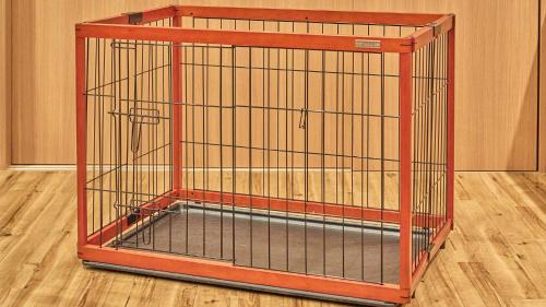 a bird cage is sitting on a wooden floor at Tokyu Vacations Izukougen in Ito