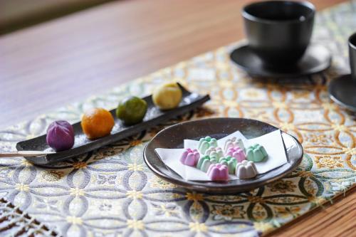 a table with two plates of desserts on a table at Tokyu Vacations Kyoto in Kyoto