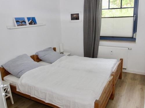 Katil atau katil-katil dalam bilik di Herring Gull Comfortable holiday residence