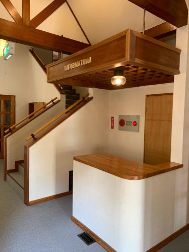 a stairwell in a room with a stair case at 旅宿景雅 in Yamanakako