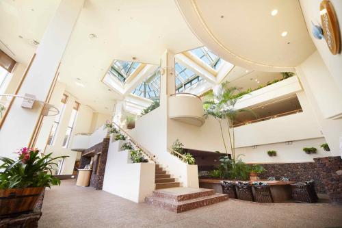 a staircase in a building with skylights at Tokyu Vacations Izuimaihama in Kawazu