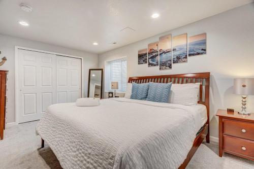 a bedroom with a large bed with a wooden headboard at Orchid Oasis - 2 Kings Foosball BBQ Fire Pit in Colorado Springs