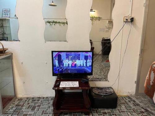 a computer sitting on a table in a room at Near Aeon Taiping and Taiping Sentral Mall in Kamunting