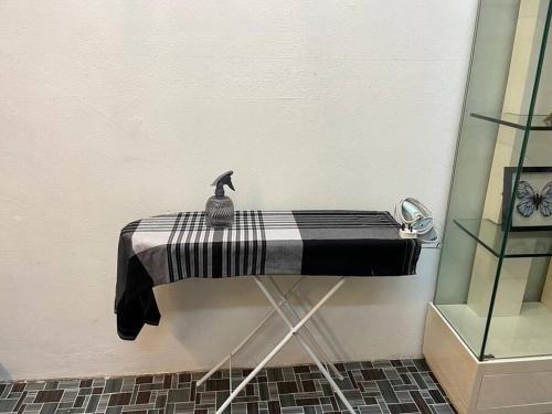 a black and white table with a duck on it at Near Aeon Taiping and Taiping Sentral Mall in Kamunting