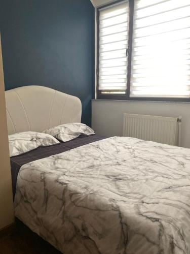 Postel nebo postele na pokoji v ubytování Sweet home в малом центре Еревана