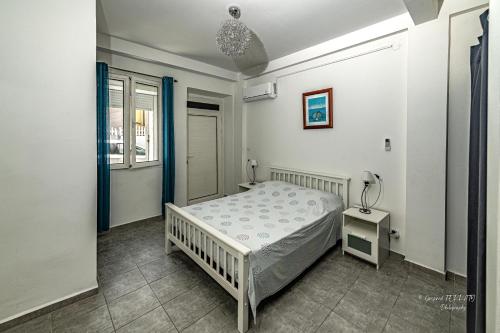 Postel nebo postele na pokoji v ubytování L'heure Dorée - Charmant appartement vue mer