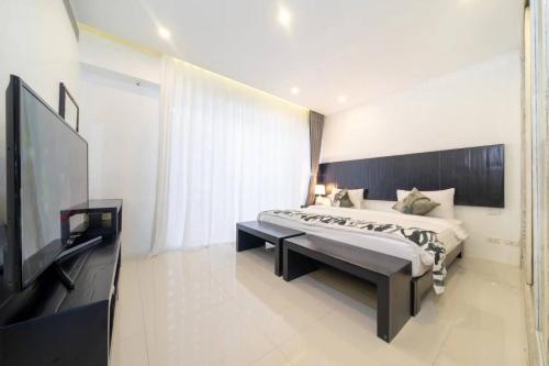Μια τηλεόραση ή/και κέντρο ψυχαγωγίας στο Patong WiN HOUSE Villa